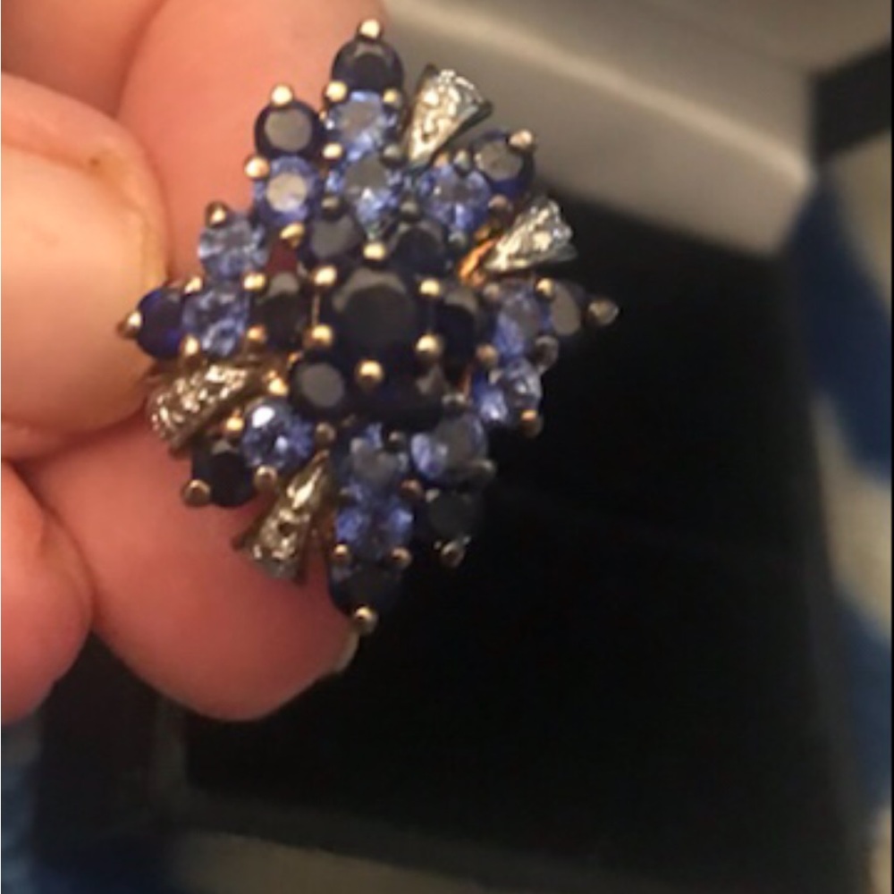 Stunning Sapphire and Diamond ring.Size 5 (size to small for me or I would keep)